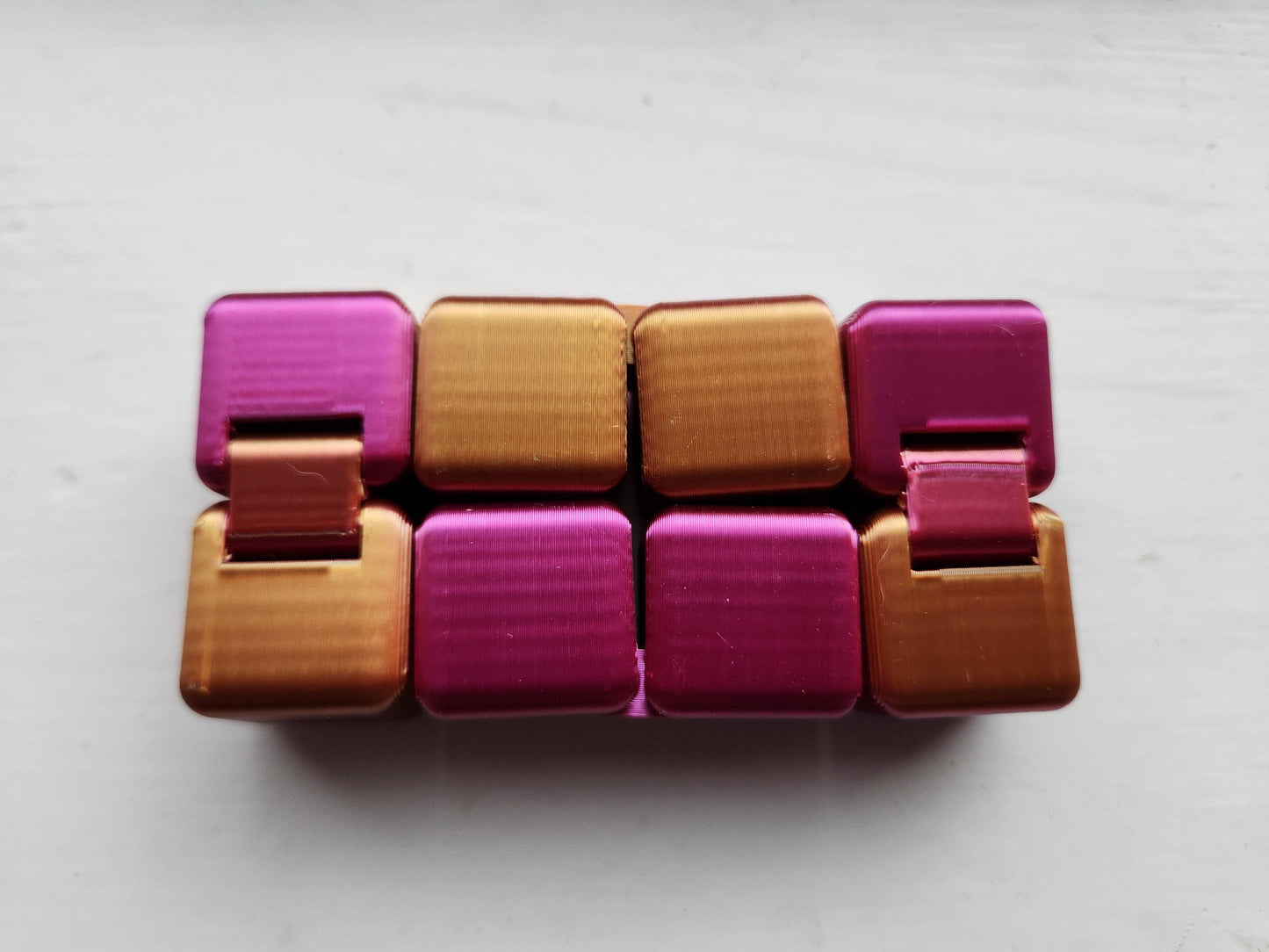 Infinity Cube- Endless Fidgeting Fun: Magenta-Gold
